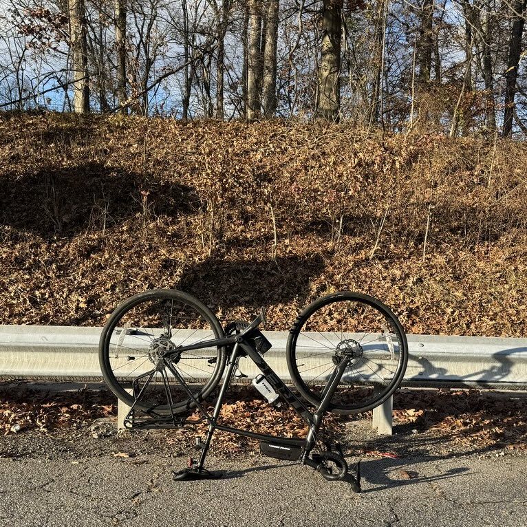 Flat in West Hills, hitting something hard while riding along a leaf-strewn bike path next to Security Boulevard. I should stick to the roads.